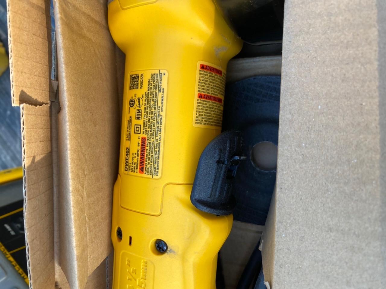 DEWALT Angle Grinder, 4-1/2 in., 11 Amp, 11,000 RPM, Dust Ejection System, Electric Grinder Tool with Abrasive Wheel Included (DWE402W) customer photo 2