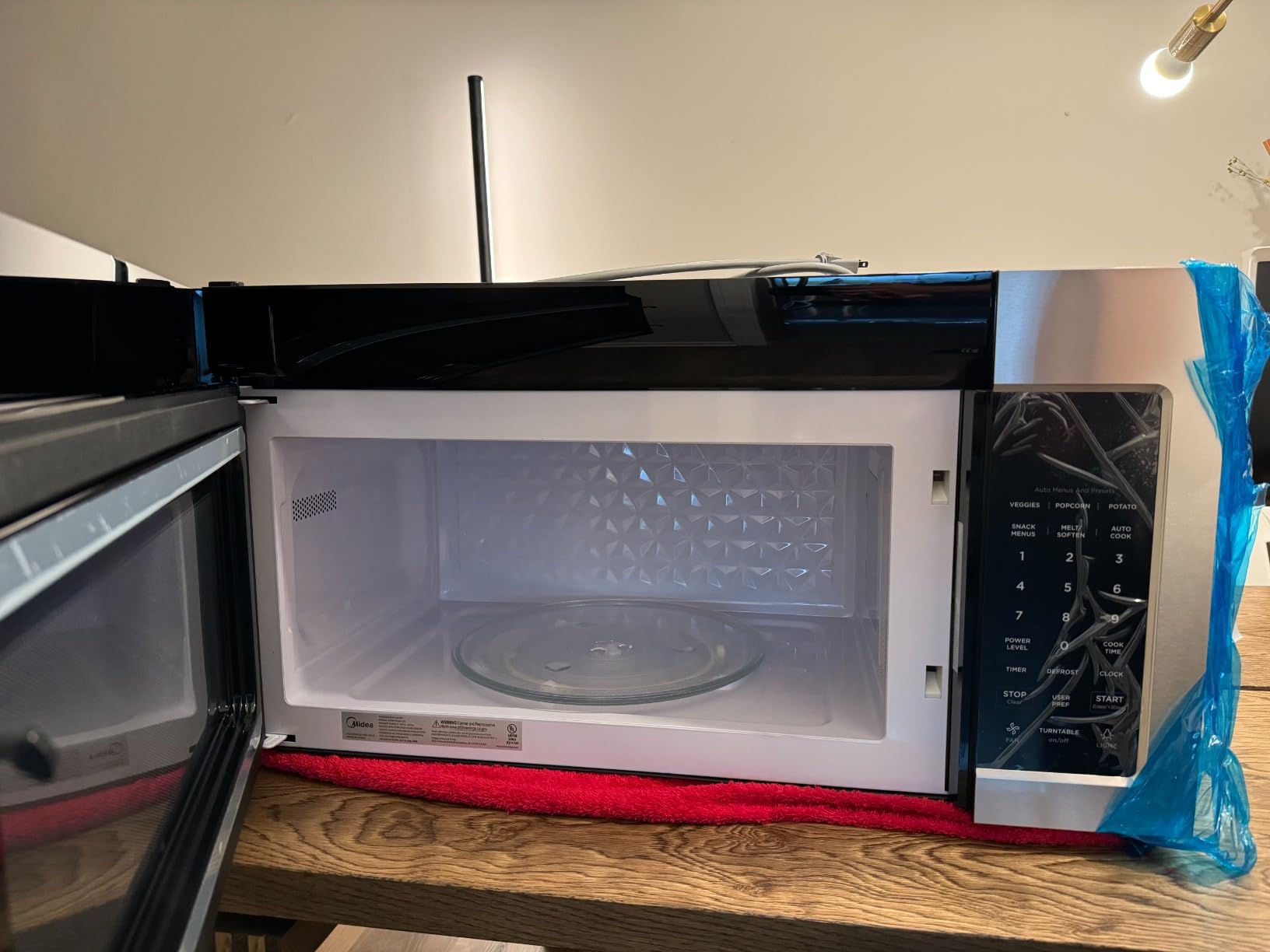 Midea Over the Range Microwave Oven, 1.7 Cu.Ft, 1000W, Stainless Steel, Smart Touch Panel, 18 Auto Cook Menus, 300 CFM Ventilation, 10 Power Levels customer photo 1