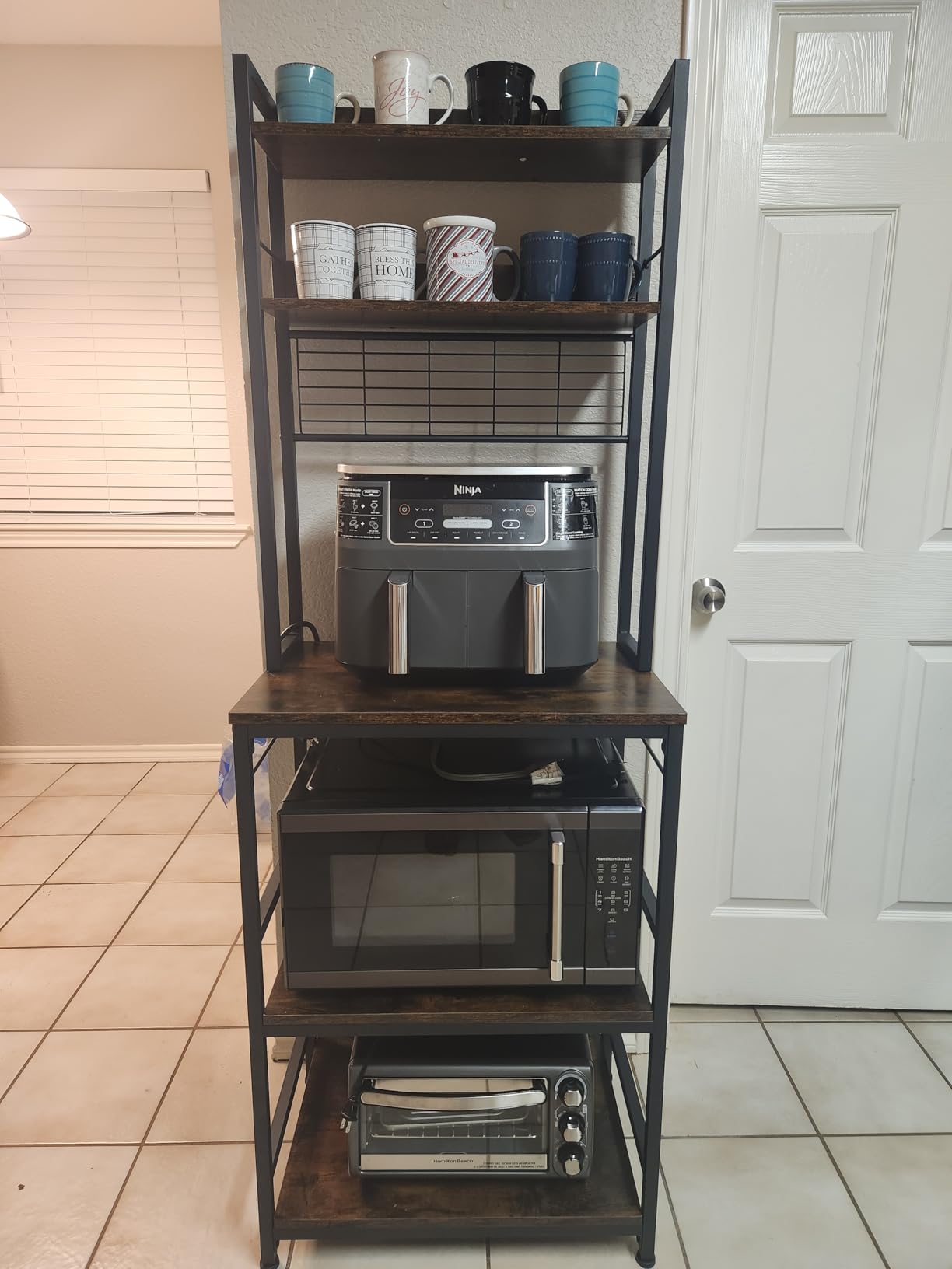 VASAGLE Bakers Rack with Power Outlet, Microwave Stand, Kitchen Tall Utility Storage Shelf, with Metal Wire Panel, 14 Hooks, 15.7 x 23.6 x 66.9 Inches, Rustic Brown and Ink Black UKKS037B01 customer photo 2