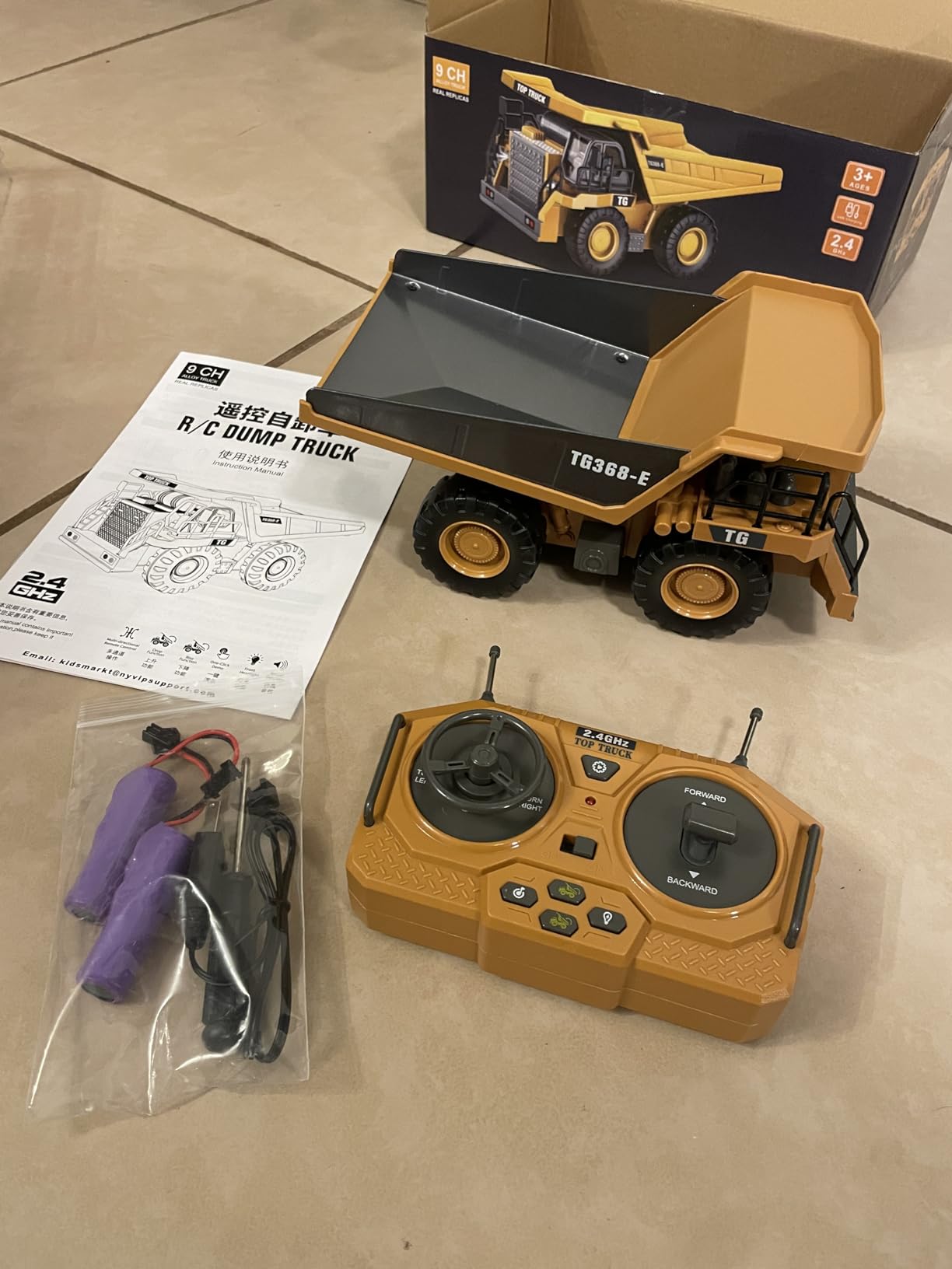 KIDMARKT RC Dump Truck Toy for Kids | 9-Channel Metal Construction Vehicle with Working Bed, Lights & Sounds, Rechargeable Remote Control Truck for Boys Ages 3-12, Durable STEM Gift for Birthday 2026 customer photo 1