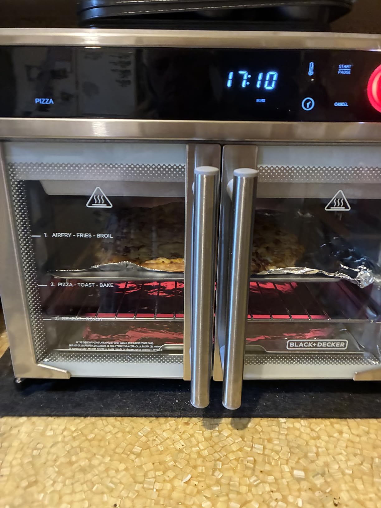 BLACK+DECKER 12-in-1 Crisp 'N Bake Air Fryer Toaster Oven | 12-in-1 air fryer toaster oven fits a 12-inch pizza with convection cooking for crispy, fast family meals. customer photo 1