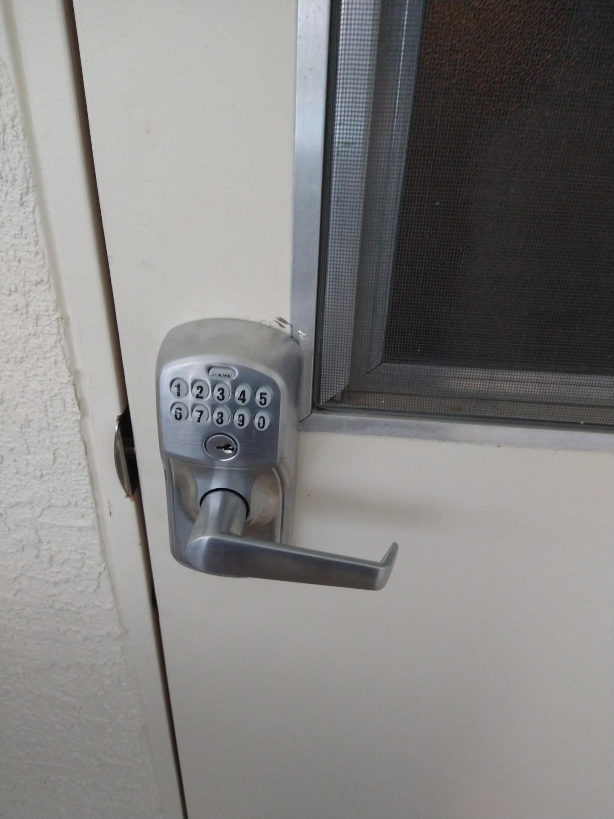 Schlage Electronic Keypad Lock, Lever Handle, Plymouth Trim, Satin Chrome | Keypad door lock with handle, Keyless entry, Push button keypad, Auto-lock enabled, Certified security, Easy install, FE575 customer photo 1