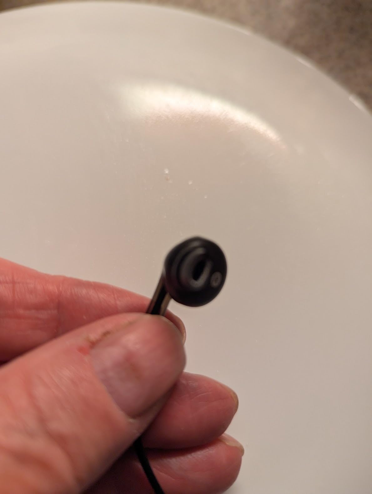 Amazon Basics Wired Earbuds with Microphone, In-Ear Headphones, 3.5mm Jack, High Definition Sound, Secure Fit, 4.2 ft Cable, S/M/L Ear Tips, Black customer photo 2