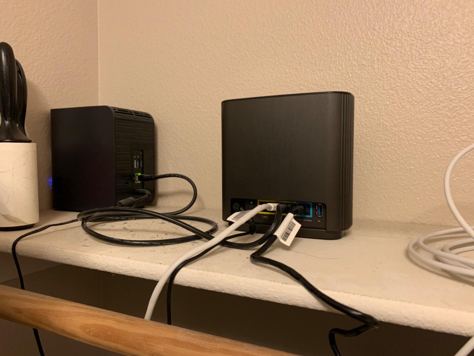 ASUS ZenWiFi AX Whole-Home Tri-Band Mesh WiFi 6 System (XT8) - 2 Pack, Coverage up to 5,500 sq.ft or 6+Rooms, 6.6Gbps, WiFi, 3 SSIDs, Life-time Network Security and Parental Controls, 2.5G Port customer photo 2