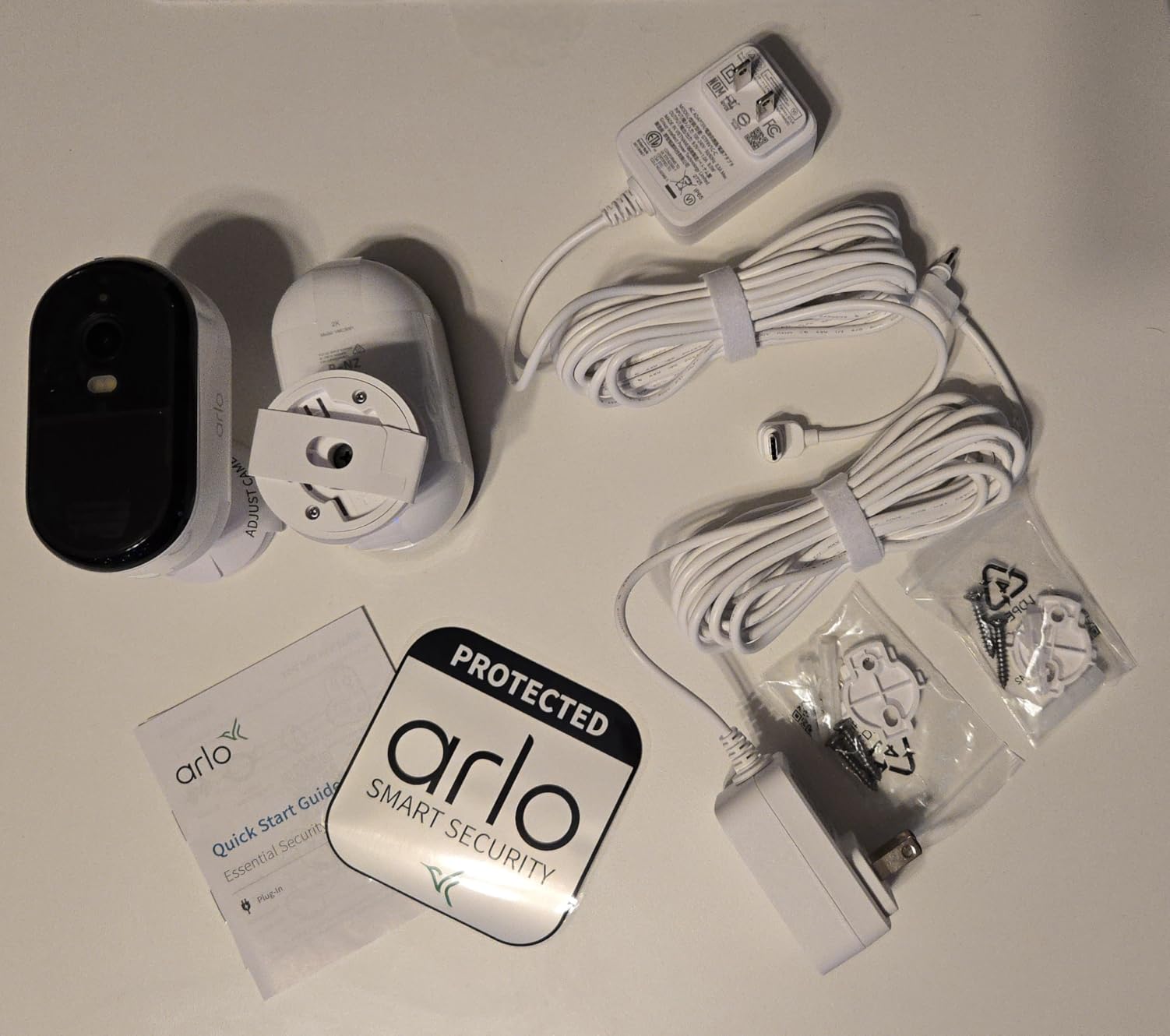 Arlo Essential Plug-in Security Camera 2K (3rd Gen) - 1-Cam | Wired surveillance camera, requires AC outlet; 16 ft cable; Color Night Vision; Intelligent Alerts; 1-mo Secure plan incl. customer photo 1